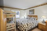 Bedroom with a Comfortable King Bed and a Bunkbed